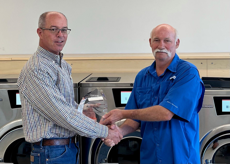 SLE Honors Orlando Consultant with Industry Service Award